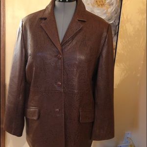 Embossed leather jacket in rich cognac color.